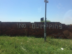 Mamelodi private wall reading “NO DUMPING”